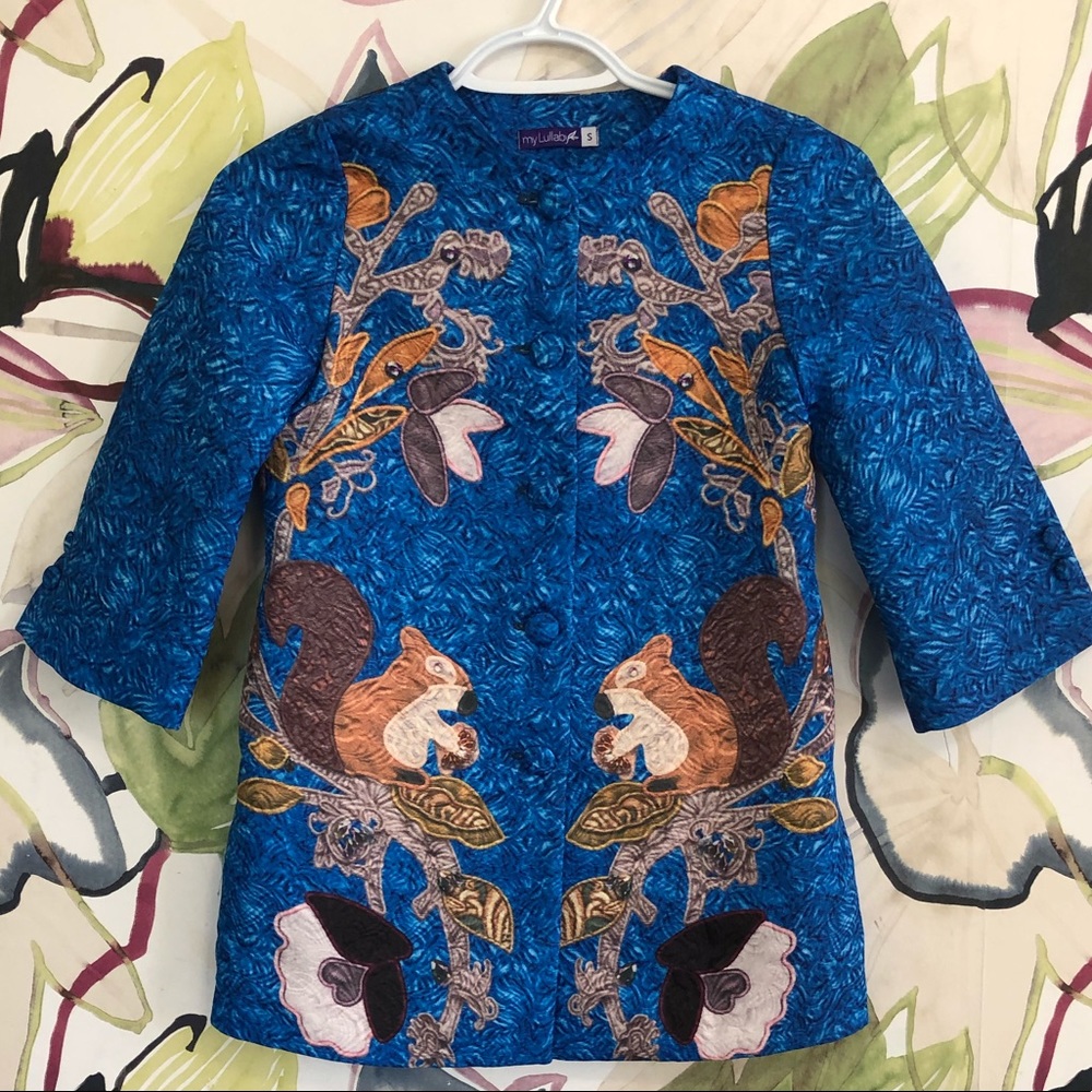 Girl squirrel jacket.